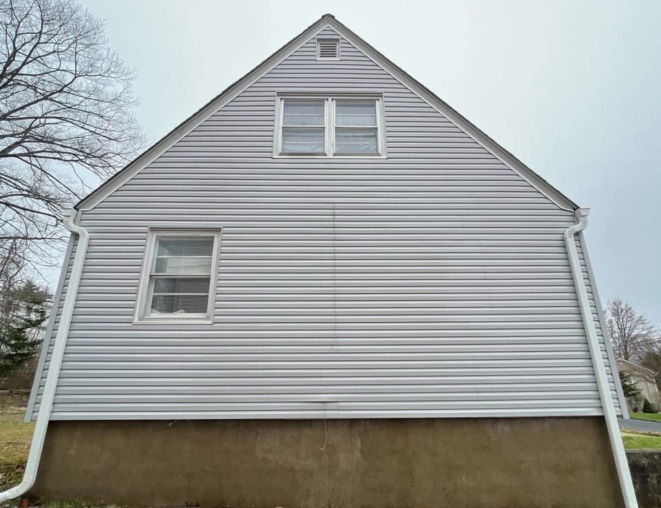 North Ridgeville Power Washing technician performing detailed house washing in North Ridgeville residential area